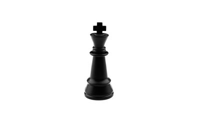 Close-up of chess pieces against white background