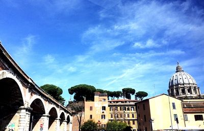 Low angle view of church against blue sky