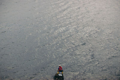 High angle view of person standing on floor