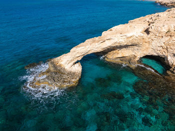 High angle view of man swimming in sea