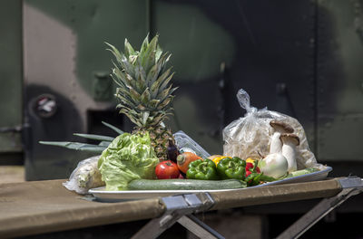 Various fruits and vegetables on table during camping