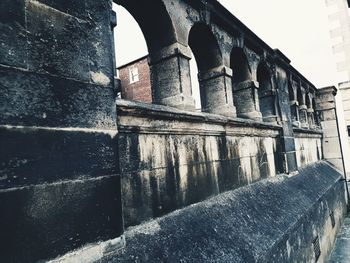 Low angle view of old building against sky