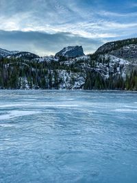 Scenic view of mountains against sky during winter