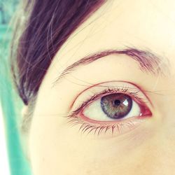 Close-up portrait of young woman eye