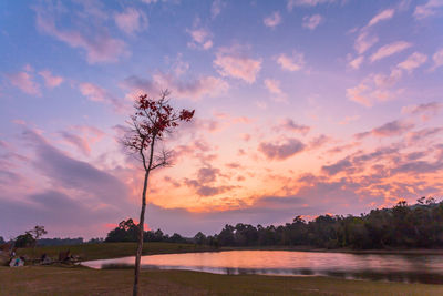 Scenic view of sea against sky at sunset