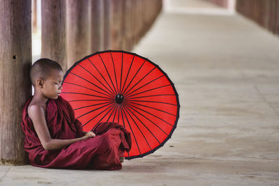 Boy sitting in temple