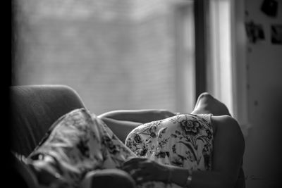 Man relaxing on sofa at home