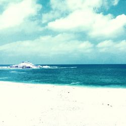 Scenic view of beach against sky