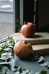 Close-up of apple on table at home