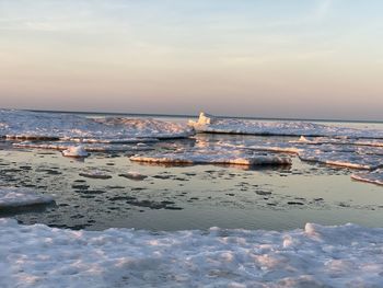 Scenic view of sea against sky during sunset