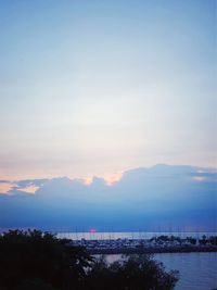 Scenic view of sea against sky at sunset