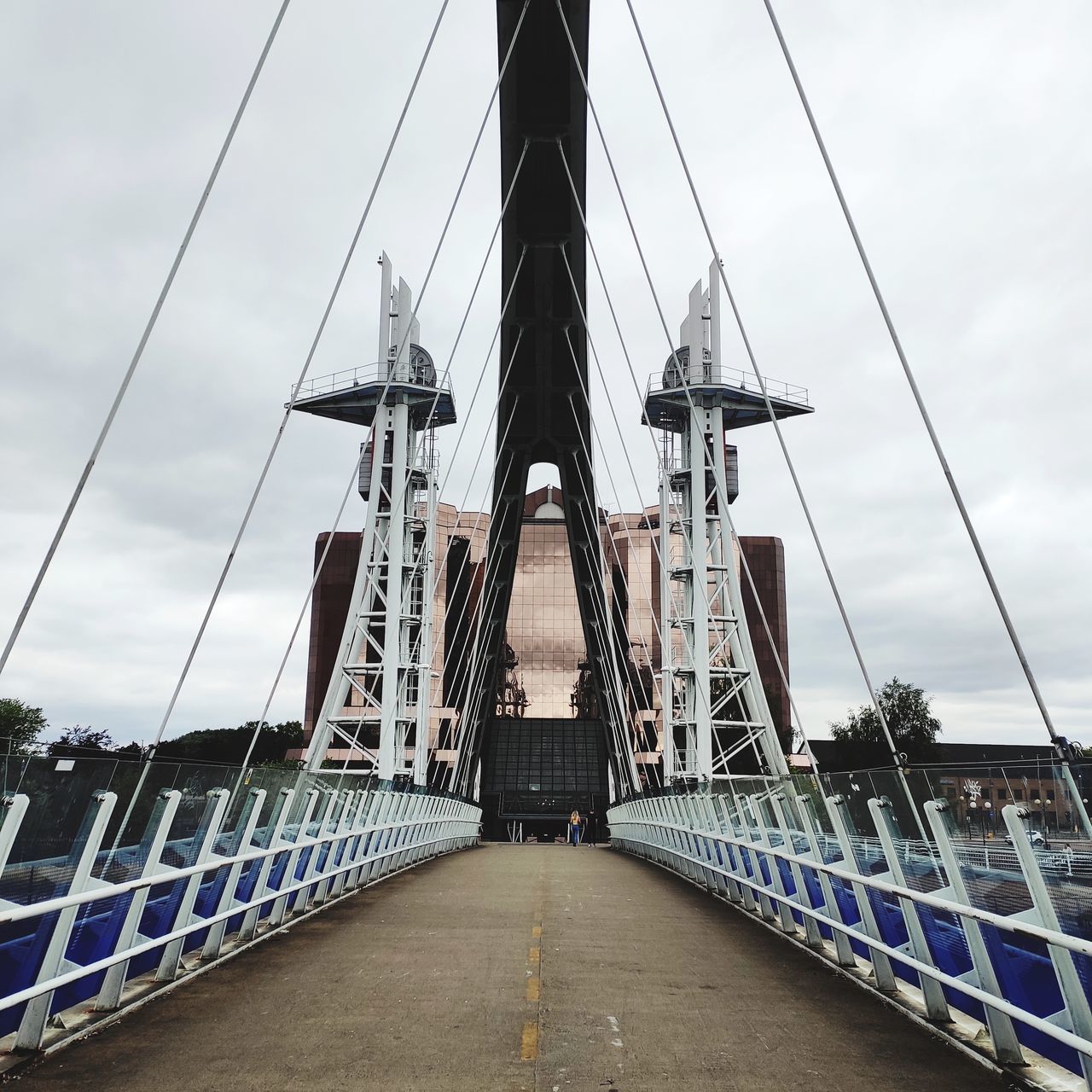 LOW ANGLE VIEW OF SUSPENSION BRIDGE