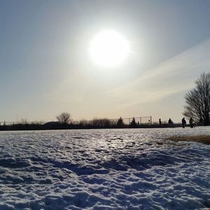 Sun shining through clouds