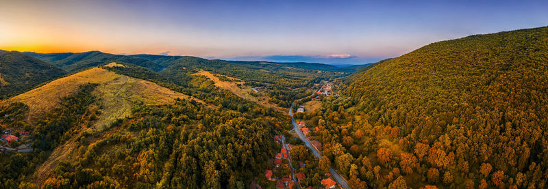 Scenic view of mountains against sky during sunset