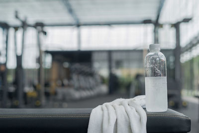 Close-up of hand holding bottle