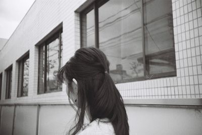 Rear view of woman in building