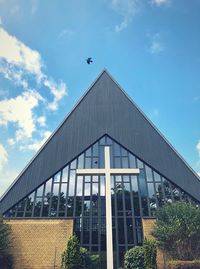 Low angle view of modern building against sky