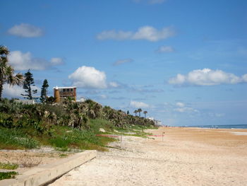 Scenic view of beach against sky