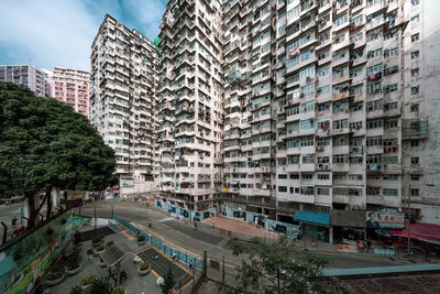 High angle view of street amidst buildings in city