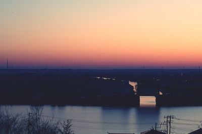 Scenic view of river during sunset