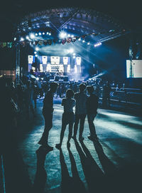 People enjoying illuminated at night