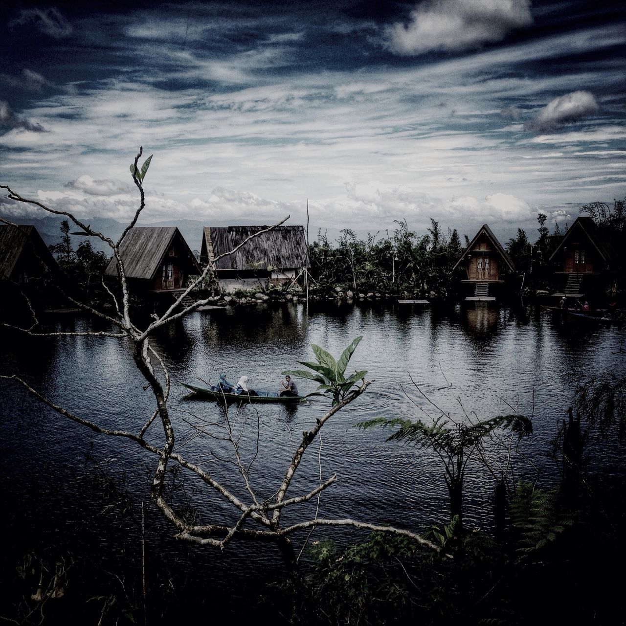 water, sky, building exterior, built structure, architecture, cloud - sky, reflection, waterfront, lake, nature, river, cloud, cloudy, house, sea, tranquility, rippled, outdoors, nautical vessel, day