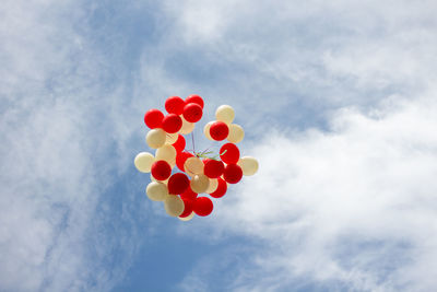 Low angle view of balloons in the sky