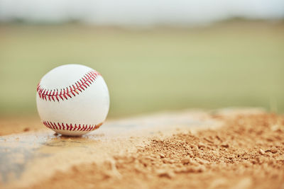 Close-up of baseball on field