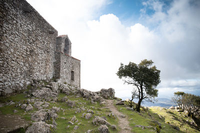 Low angle view of old ruins against sky