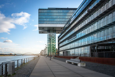 Modern buildings in city against sky