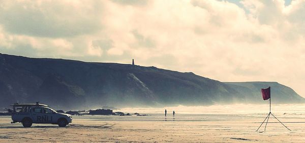 Scenic view of beach against sky