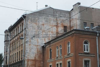 Low angle view of residential building against sky