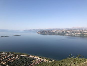 High angle view of lake against clear blue sky