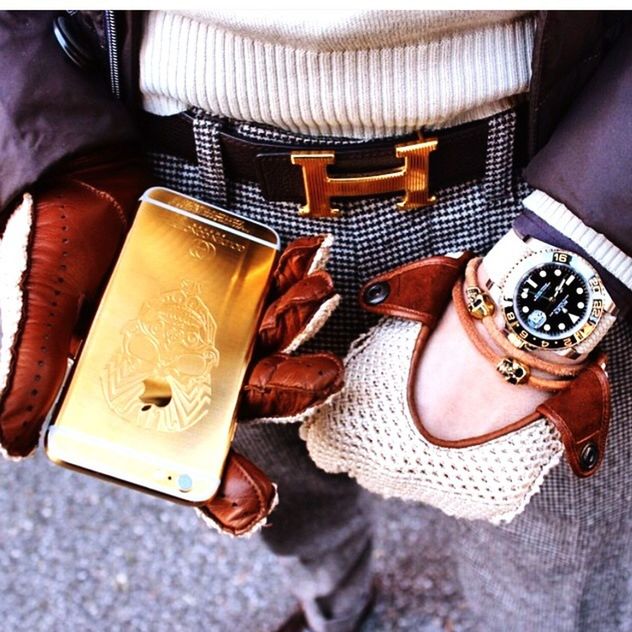 indoors, technology, close-up, part of, high angle view, person, connection, wireless technology, old-fashioned, wristwatch, communication, table, selective focus, holding, lifestyles, midsection, cropped