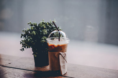 Close-up of drink in jar on table