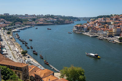 High angle view of townscape by sea