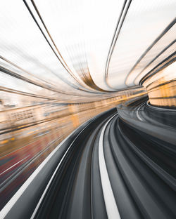 Blurred motion of railroad track in city