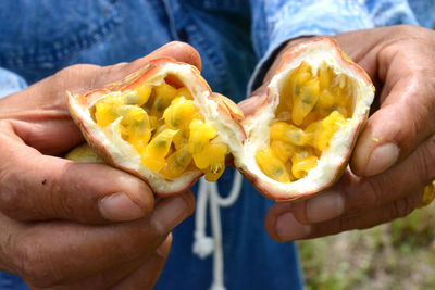 Close-up of man eating food