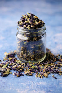 Close-up of spices in jar on table