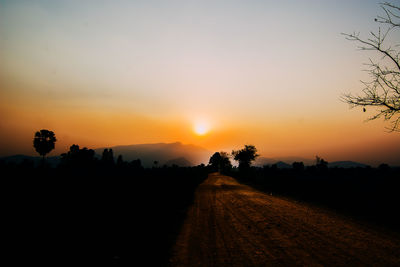 Scenic view of silhouette landscape against sky during sunset