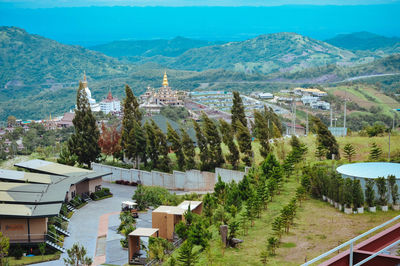 High angle view of houses and buildings in city