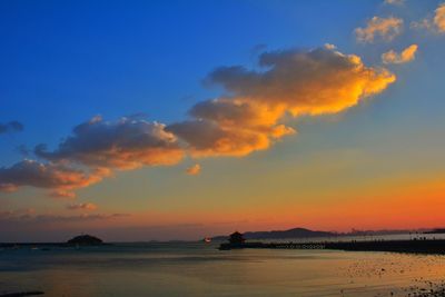 Scenic view of sea at sunset