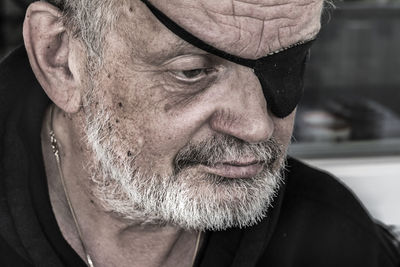 Close-up of serious senior man