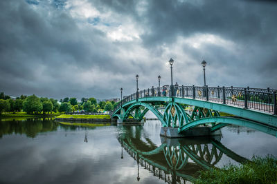 The landscape of tsaritsyno park bridge at cloudy sky