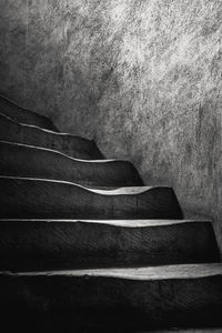 Low section of man standing on steps