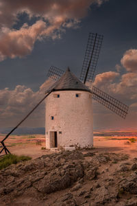 Windmill at consuegra at sunset 