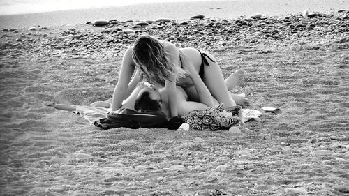 Woman sitting on beach