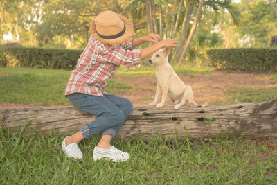 Man with dog on grass