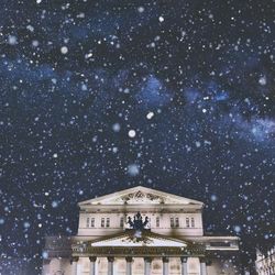 Low angle view of building against sky at night