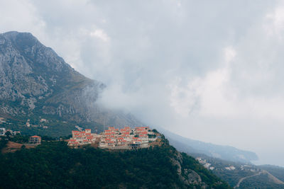 Scenic view of townscape against sky